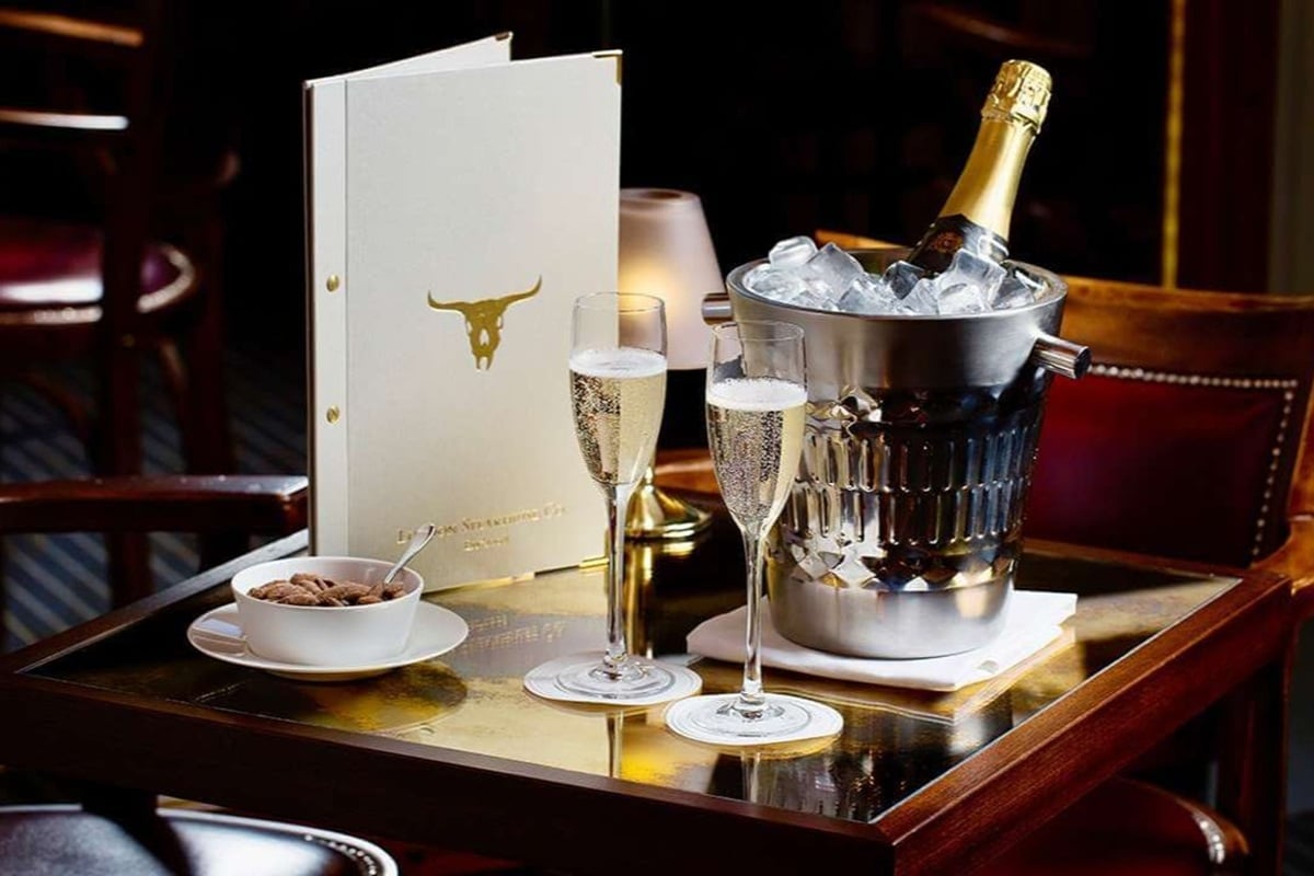 Three Courses Champagne and Sides for Two at London Steakhouse Co